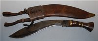 Lot 343 - A kukri, the 34cm blade stamped 1917, having a...