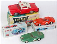 Lot 3201 - Three various boxed tinplate and plastic...