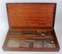 Lot 3203 - A Meccano style wooden storage box with...