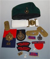 Lot 365 - A Royal Marines Green Beret, bearing a label...