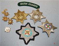 Lot 367 - A collection of cloth badges and metal...