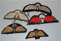 Lot 382 - A collection of five cloth balloon wing badges