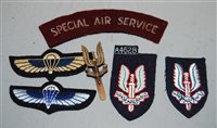 Lot 383 - A small collection of SAS cloth badges, to...