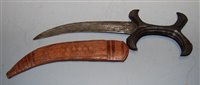 Lot 385 - A 19th century Sudanese dagger, having curved...