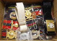 Lot 386 - A collection of assorted military belts and...