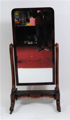 Lot 1592 - A Victorian mahogany cheval mirror, the...