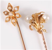 Lot 2502 - Two cased pearl stick pins, the first with two...