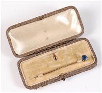Lot 2503 - A convertible sapphire stick pin: the round...