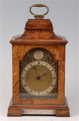 Lot 36 - A mid-20th century walnut cased mantel clock