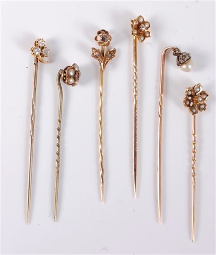 Lot 2523 - Six stick pins: to include a 9ct seed pearl...