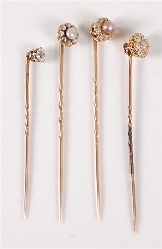Lot 2524 - Four diamond and seed pearl stick pins: to...