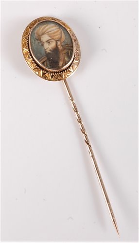 Lot 2529 - A painted stick pin an Ottoman style gentleman,...