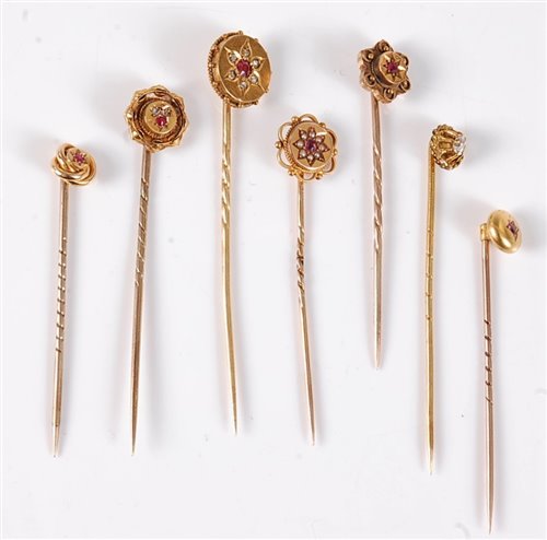Lot 2539 - Seven ruby, diamond and pearl stick pins: an...