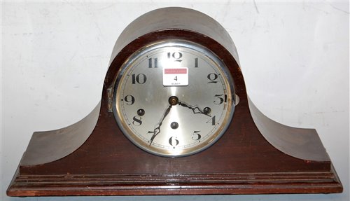 Lot 4 - A 1920s mahogany cased mantel clock, having a...