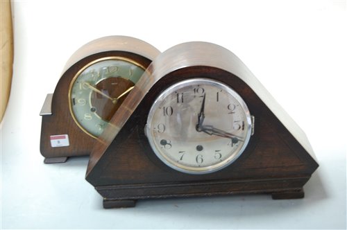 Lot 8 - A 1930s oak cased mantel clock, having...