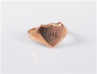 Lot 419 - A 9ct gold shield shaped signet ring,...