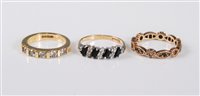 Lot 422 - Three 9ct gold rings: a 9ct five stone diamond...