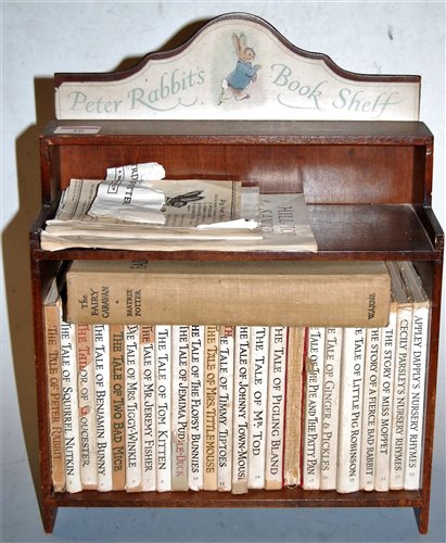 Lot 26 - A miniature bookshelf, with label for Peter...