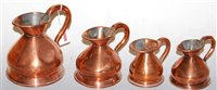 Lot 36 - A set of four 19th century copper jugs, to...