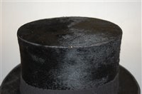 Lot 38 - An early 20th century brushed velvet top-hat,...