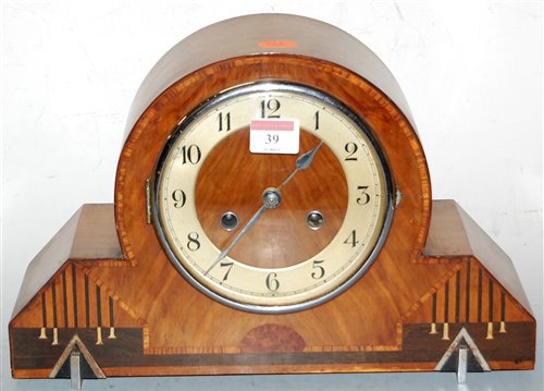 Lot 39 - An Art Deco walnut cased mantel clock, having...