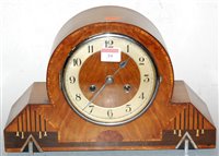 Lot 39 - An Art Deco walnut cased mantel clock, having...