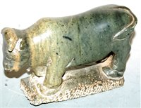 Lot 45 - A carved soapstone figure of a bull, in...