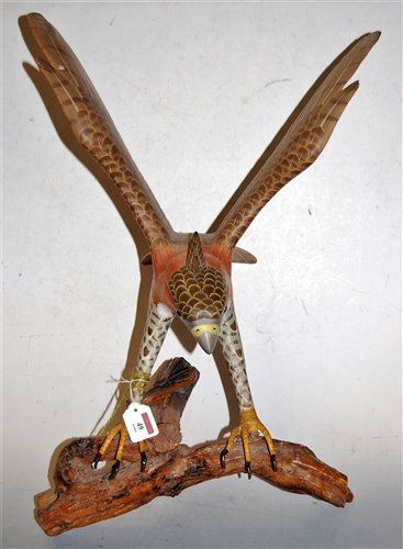 Lot 49 - A large carved and painted model of an eagle,...