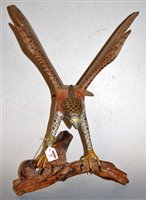 Lot 49 - A large carved and painted model of an eagle,...