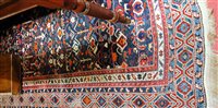 Lot 1192 - A Persian woollen rug, the blue ground...