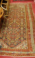 Lot 1197 - A Persian woollen rug, the blue ground...