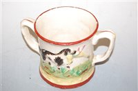 Lot 206 - A Staffordshire twin handled frog loving cup,...