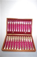 Lot 245 - A circa 1900 cased set of twelve silver plated...