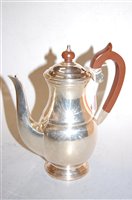 Lot 250 - A modern silver footed coffee pot and cover,...