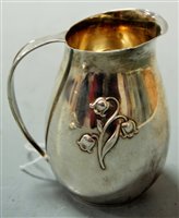 Lot 253 - A Gorham sterling silver cream jug, embossed...