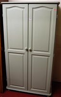 Lot 1135 - A modern painted pine double door wardrobe,...