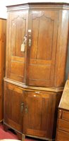 Lot 1138 - An unusual early 19th century oak freestanding...