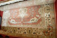 Lot 1209 - An English machine woven rug from the Walden...