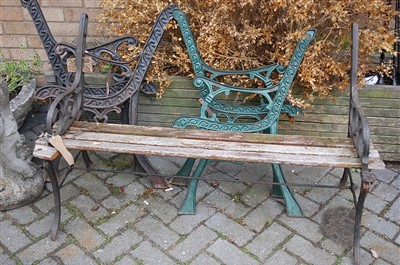 Lot 1142 - A metal ended and slatted two-seater garden...