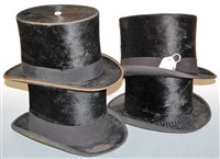 Lot 53 - An Edwardian brushed velvet top hat bearing a...
