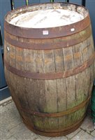 Lot 1176 - An oak metal bound barrel, h.97.5cm