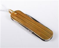 Lot 456 - A yellow metal penknife, the outer yellow...