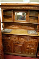 Lot 1222 - A circa 1900 heavily relief carved oak...