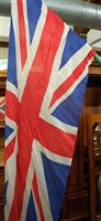 Lot 1223 - Two large Union flags on painted wood poles