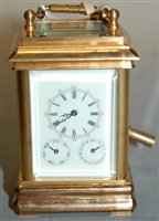Lot 289 - A lacquered brass cased minuet carriage clock,...