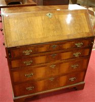 Lot 1232 - A Georgian style figured walnut and...