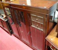 Lot 1261 - A reproduction mahogany double door glazed...