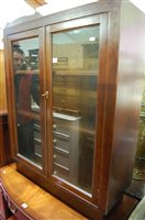 Lot 1262 - An oak double door glazed bookcase, w.86cm