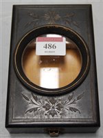 Lot 486 - A Victorian ebonised box wood watch holder...