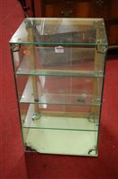 Lot 1276 - A glazed table-top shop display cabinet,...